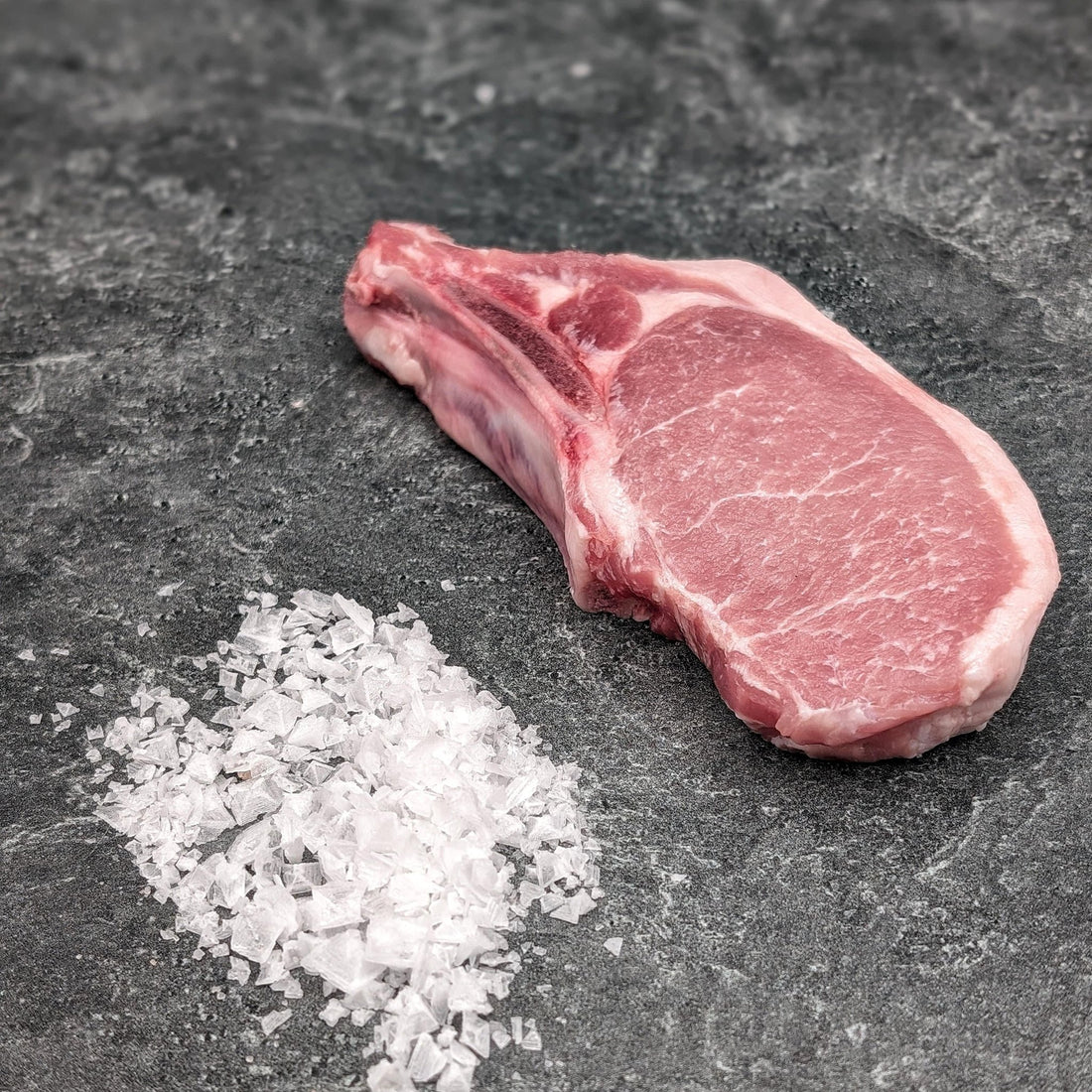 Frozen pork chop loin chop from Thailand - center-cut, bone-in or boneless, classic restaurant and retail staple